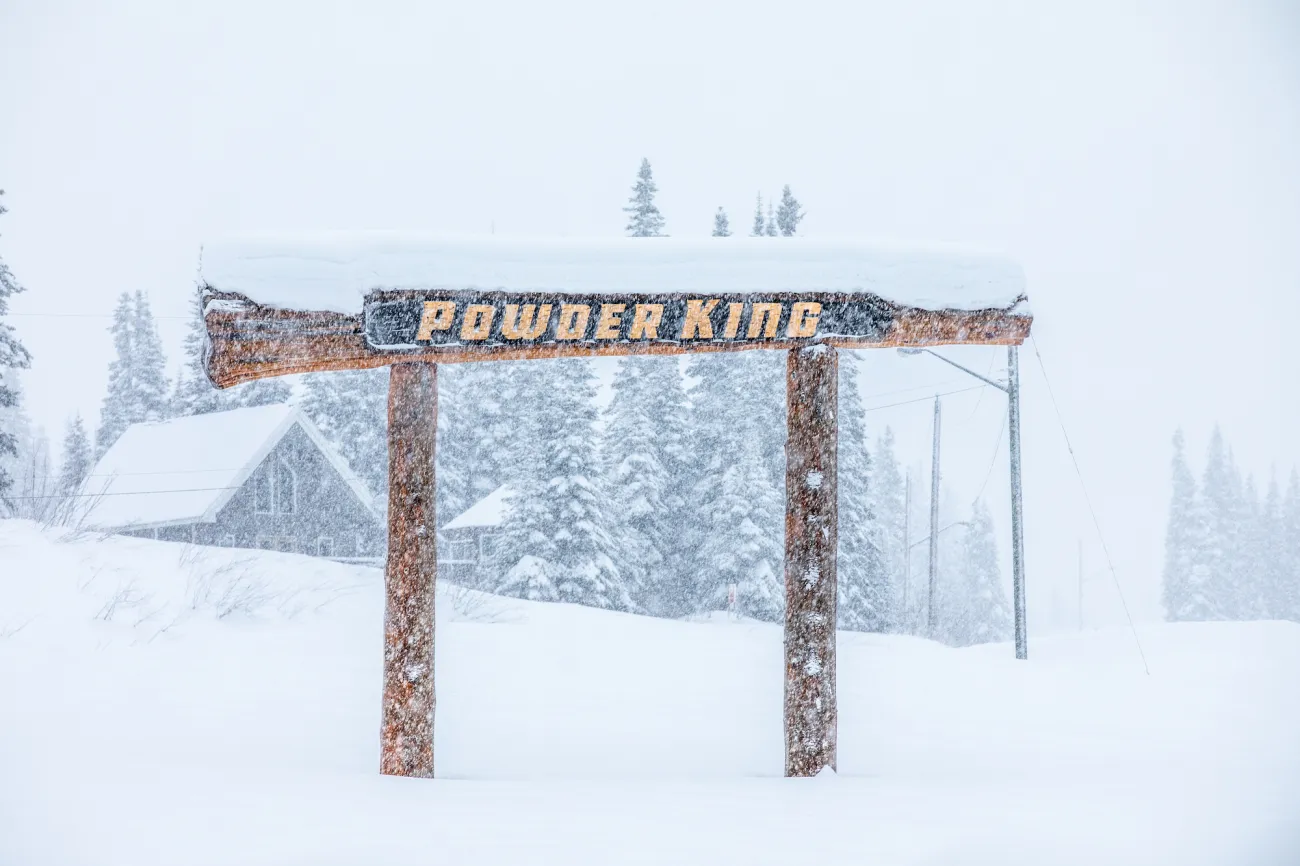 Powder King sign covered in deep snow
